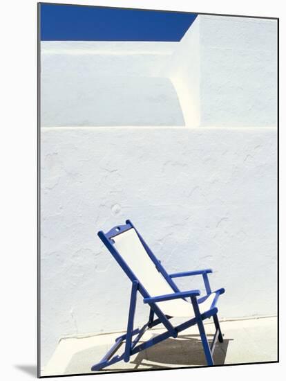 Deckchair Against Whitewashed Wall, Imerovigli, Santorini (Thira), Cyclades Islands, Greece-Lee Frost-Mounted Photographic Print