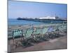 Deckchairs Above the Beach and the Palace Pier at Brighton, Sussex, England, United Kingdom, Europe-Rainford Roy-Mounted Photographic Print