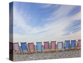 Deckchairs on Pebble Beach, Sidmouth, Devon, Uk-Peter Adams-Stretched Canvas