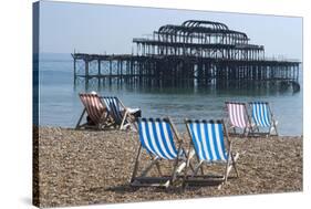 Deckchairs on the Pebble Beach Seafront with the Ruins of West Pier Brighton England-Natalie Tepper-Stretched Canvas
