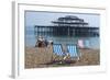 Deckchairs on the Pebble Beach Seafront with the Ruins of West Pier Brighton England-Natalie Tepper-Framed Photo