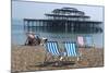 Deckchairs on the Pebble Beach Seafront with the Ruins of West Pier Brighton England-Natalie Tepper-Mounted Photo