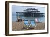 Deckchairs on the Pebble Beach Seafront with the Ruins of West Pier Brighton England-Natalie Tepper-Framed Photo