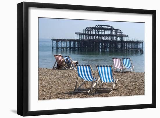 Deckchairs on the Pebble Beach Seafront with the Ruins of West Pier Brighton England-Natalie Tepper-Framed Photo