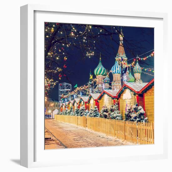 Decorations for New Year and Holidays. Christmas Balls on Tree Branches near to St. Basil's Cathedr-Mikhail St-Framed Photographic Print