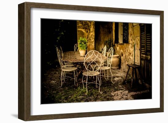Decorative Table and Chairs on Patio in France-Will Wilkinson-Framed Photographic Print