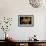 Decorative Table and Chairs on Patio in France-Will Wilkinson-Framed Photographic Print displayed on a wall