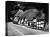 Deep Thatched Cottages at  Wherwell, Hampshire, England-J. Chettlburgh-Stretched Canvas