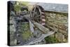 Defunct Undershot Waterwheel on Old Mill Ruin on Welsh Hillside-null-Stretched Canvas