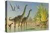 Deinocheirus Dinosaurs Watch a Group of Argentinosaurus Walk Through Shallow Waters-null-Stretched Canvas