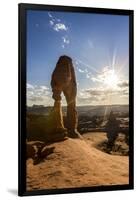 Delicate Arch with sun and clouds at golden hour, Arches National Park, Moab, Grand County, Utah, U-Francesco Vaninetti-Framed Photographic Print