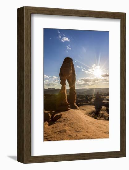 Delicate Arch with sun and clouds at golden hour, Arches National Park, Moab, Grand County, Utah, U-Francesco Vaninetti-Framed Photographic Print