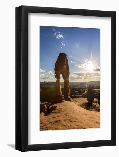 Delicate Arch with sun and clouds at golden hour, Arches National Park, Moab, Grand County, Utah, U-Francesco Vaninetti-Framed Photographic Print