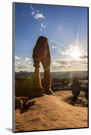 Delicate Arch with sun and clouds at golden hour, Arches National Park, Moab, Grand County, Utah, U-Francesco Vaninetti-Mounted Photographic Print