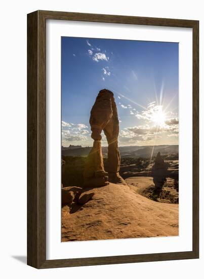 Delicate Arch with sun and clouds at golden hour, Arches National Park, Moab, Grand County, Utah, U-Francesco Vaninetti-Framed Photographic Print