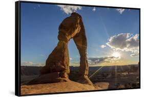 Delicate Arch with sun and clouds at golden hour, Arches National Park, Moab, Grand County, Utah, U-Francesco Vaninetti-Framed Stretched Canvas