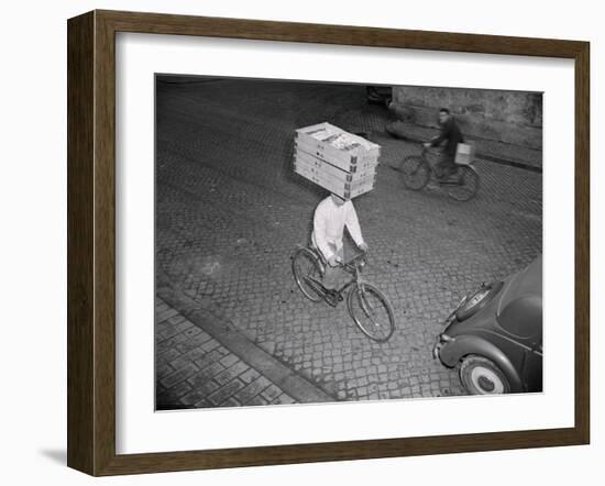 Delivery Boy Riding Bicycle with Box on Head-null-Framed Photographic Print