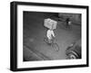 Delivery Boy Riding Bicycle with Box on Head-null-Framed Photographic Print