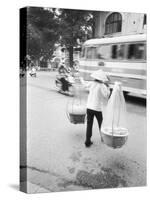 Delivery Woman, Hanoi, Vietnam-Walter Bibikow-Stretched Canvas