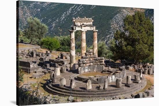 Delphi, Phocis, Greece. The tholos, dating from around 380-360 BC, beside the Sanctuary of Athen...-null-Stretched Canvas