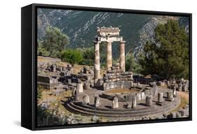 Delphi, Phocis, Greece. The tholos, dating from around 380-360 BC, beside the Sanctuary of Athen...-null-Framed Stretched Canvas