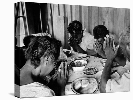 Delta and Pine Company African American Sharecropper Lonnie Fair and Family Praying before a Meal-Alfred Eisenstaedt-Stretched Canvas