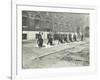 Demonstrating How to Pick Up an Unconscious Person, London Fire Brigade Headquarters, London, 1910-null-Framed Photographic Print