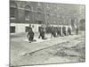 Demonstrating How to Pick Up an Unconscious Person, London Fire Brigade Headquarters, London, 1910-null-Mounted Photographic Print