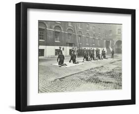 Demonstrating How to Pick Up an Unconscious Person, London Fire Brigade Headquarters, London, 1910-null-Framed Photographic Print