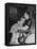 Den Mother Still in Uniform, Sleeping While Holding Her Daughter-null-Framed Stretched Canvas