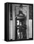 Denise Bruene Climbing Kitchen Door in Bare Feet, Her Hobby, Jan Bruene Says "Don't Fall on Me"-Gordon Parks-Framed Stretched Canvas