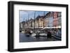 Denmark, Copenhagen, Nyhavn district. Colorful 17th and 18th century buildings, boats and canal-Alan Klehr-Framed Photographic Print