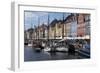 Denmark, Copenhagen, Nyhavn district. Colorful 17th and 18th century buildings, boats and canal-Alan Klehr-Framed Photographic Print