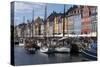 Denmark, Copenhagen, Nyhavn district. Colorful 17th and 18th century buildings, boats and canal-Alan Klehr-Stretched Canvas