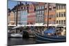 Denmark, Copenhagen, Nyhavn district. Colorful 17th and 18th century buildings, boats and canal-Alan Klehr-Mounted Photographic Print