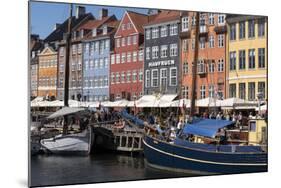 Denmark, Copenhagen, Nyhavn district. Colorful 17th and 18th century buildings, boats and canal-Alan Klehr-Mounted Photographic Print