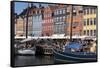 Denmark, Copenhagen, Nyhavn district. Colorful 17th and 18th century buildings, boats and canal-Alan Klehr-Framed Stretched Canvas