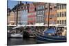 Denmark, Copenhagen, Nyhavn district. Colorful 17th and 18th century buildings, boats and canal-Alan Klehr-Stretched Canvas