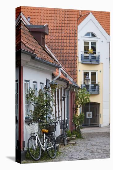 Denmark, Jutland, Aalborg, Houses Along Hjelmerstald Street-Walter Bibikow-Stretched Canvas