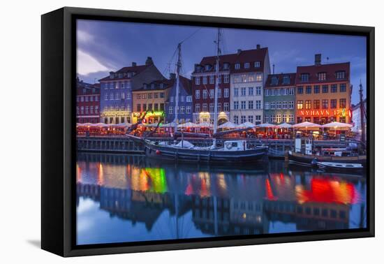 Denmark, Zealand, Copenhagen, Nyhavn Harbor, Evening-Walter Bibikow-Framed Stretched Canvas