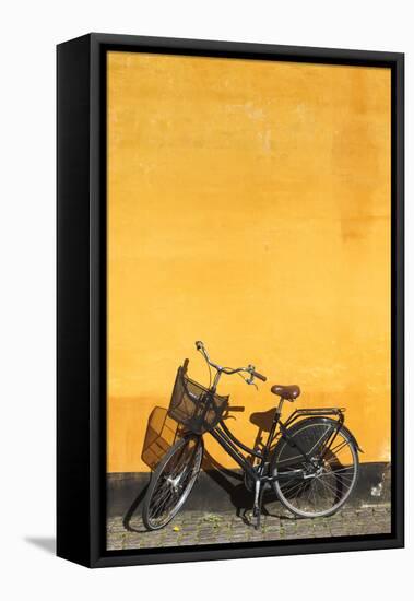Denmark, Zealand, Copenhagen, Yellow Building Detail with Bicycle-Walter Bibikow-Framed Stretched Canvas