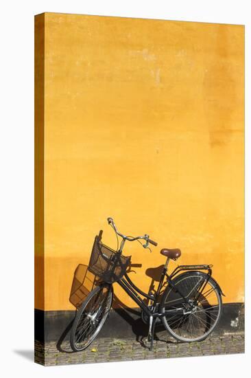 Denmark, Zealand, Copenhagen, Yellow Building Detail with Bicycle-Walter Bibikow-Stretched Canvas