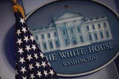 The Flag and Seal at a White House Press Briefing-Dennis Brack-Photographic Print