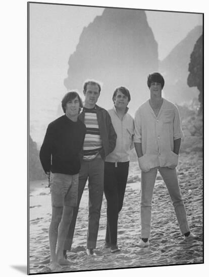 Dennis Wilson, Mike Love, Carl Wilson and Brian Wilson of the Beach Boys, Posing on Beach-Bill Ray-Mounted Premium Photographic Print