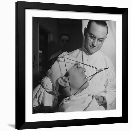 Dentist Working on a Soldier's Mouth at the Ft. Meade and Walter Reed Dental Hospital-George Strock-Framed Photographic Print