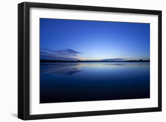 Denver, Colorado: a Bird Flies Lows over the Water During Sunrise-Brad Beck-Framed Photographic Print