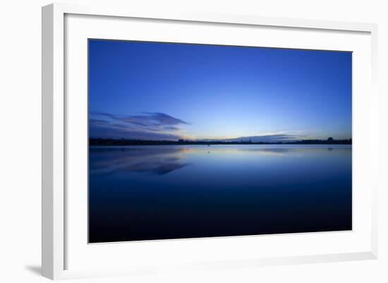 Denver, Colorado: a Bird Flies Lows over the Water During Sunrise-Brad Beck-Framed Photographic Print