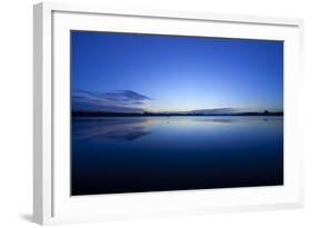 Denver, Colorado: a Bird Flies Lows over the Water During Sunrise-Brad Beck-Framed Photographic Print