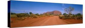 Desert Road and Ayers Rock, Australia-null-Stretched Canvas