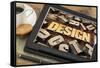 Design Word Abstract in Letterpress Wood Type on a Digital Tablet with Cup of Coffee-PixelsAway-Framed Stretched Canvas
